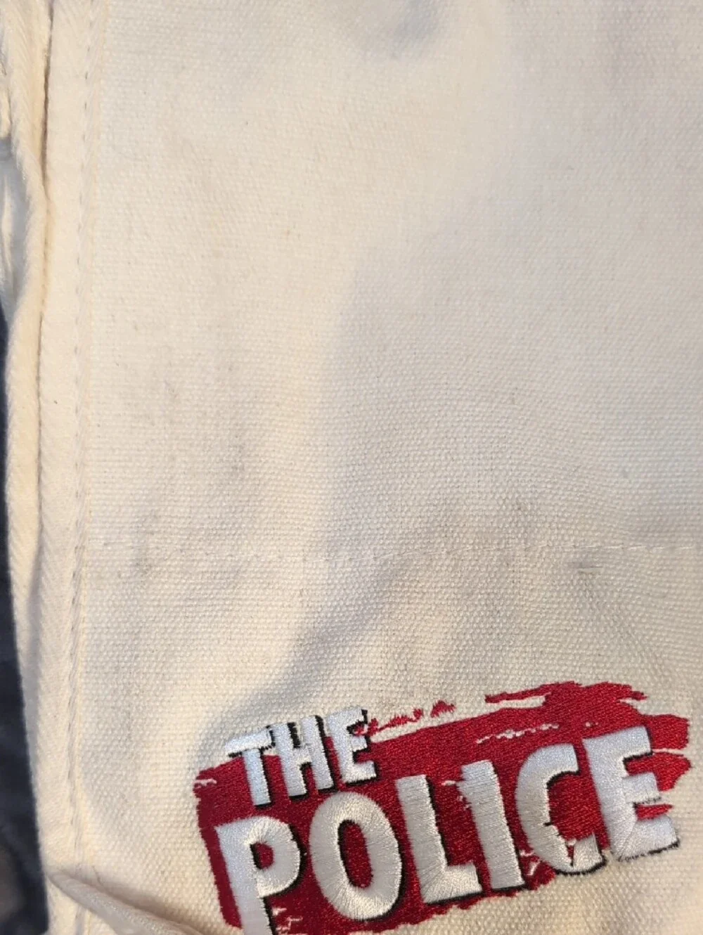 The Police Canvas Messenger Bag in Cream